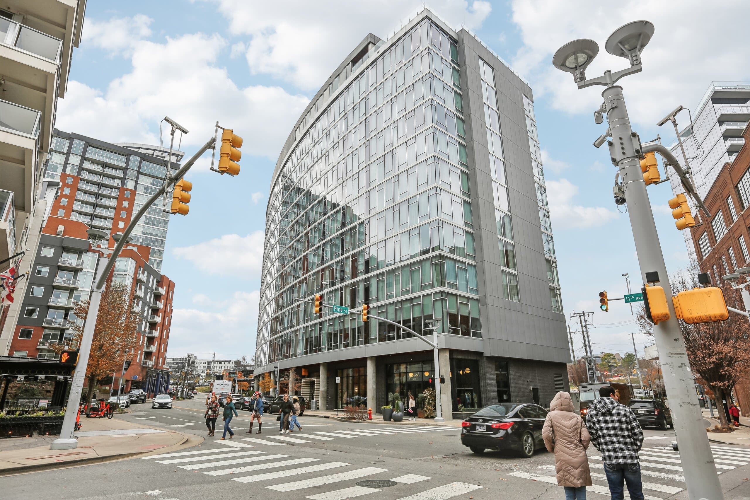 A Gulch street corner with restaurants and mid-rise glass